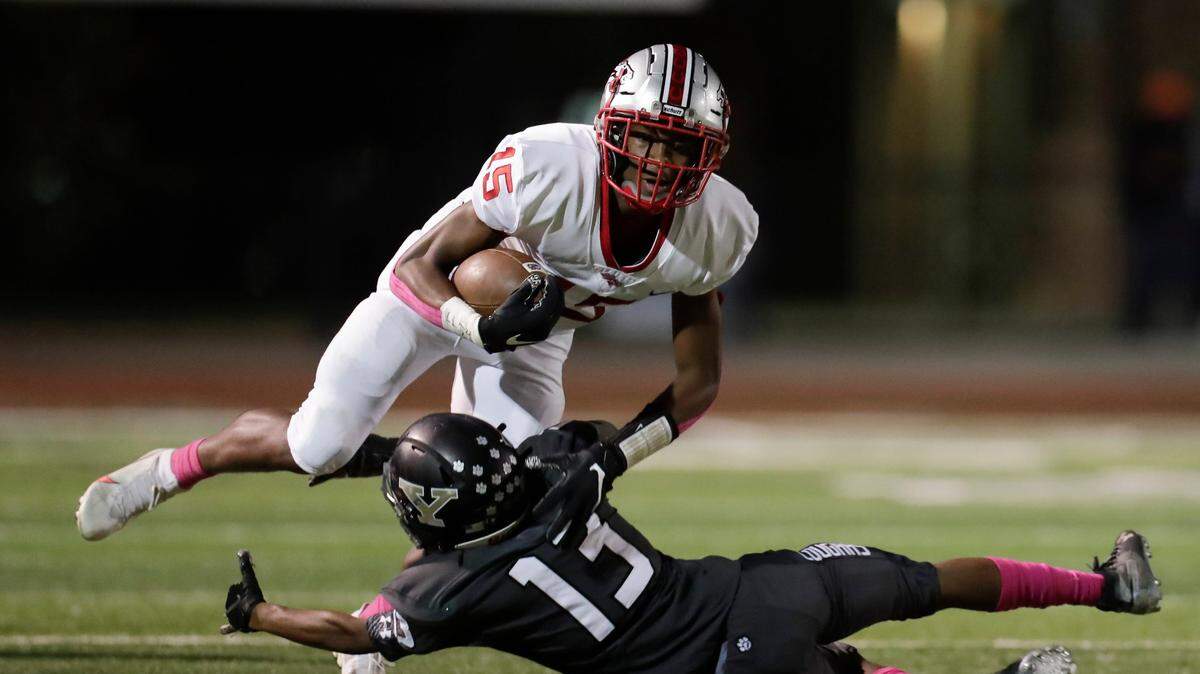 Herald file: South Pointe’s #15 Waymond Jenerette, who will lead the Stallions’ receiving corps in 2021, makes the catch and gains extra yards in first half play as the York Cougars host the South Point Stallions in conference play Friday night, 10-23-2020.