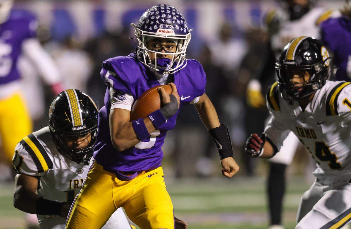 Xavier Means (5) of Northwestern carries the ball during the SCHSL Class 5A Division II championship game between Irmo and Northwestern on Dec. 5, 2025, at Oliver C. Dawson Stadium in Orangeburg.