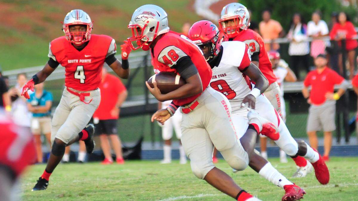 South Pointe’s Troy Frazier returns an interception Aug. 31 against Nation Ford. Coming off their first loss in 2 seasons last week to Rock Hill, South Pointe came back strong with a 47-7 lead at the half.