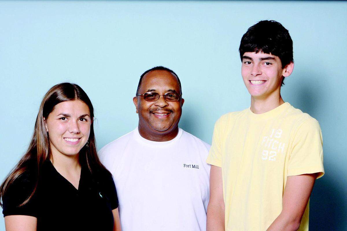 Hearld file: In 2008, Fort Mill coach Willie Ware was named All-Area Tennis Coach of the Year. Pictured to his left, Northwestern’s Sally Bartelmo was The Herald’s All-Area Girls Tennis Co-Player of the Year, and to his right, William Reigel was the All-Area Boys Tennis Player of the Year.