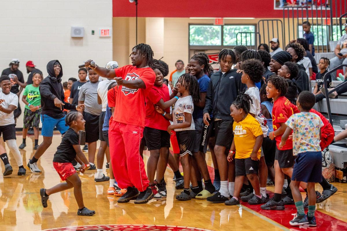 Derion Kendrick, Rams cornerback and South Pointe High School alum, poses with campers of his two-day youth football camp in Rock Hill.