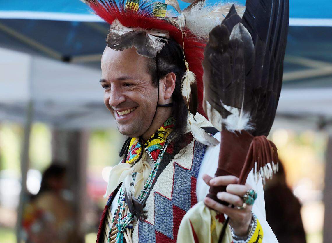 Catawba Indian Travis Blue speaks with visitors at the 2019 Yap Yè Iswà festival on the tribe’s reservation.