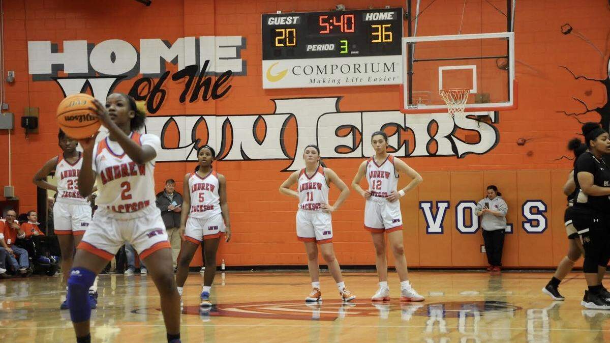 Osha Black shoots a technical foul shot with her Andrew Jackson teammates watching on Friday, Feb. 21, 2020.
