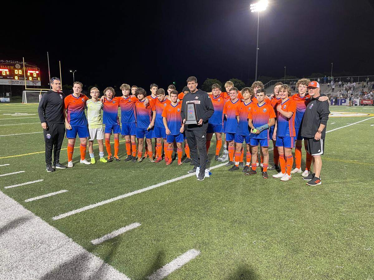 The Andrew Jackson boys’ soccer team poses with the second-place trophy after losing the 2A state championship game in Irmo.