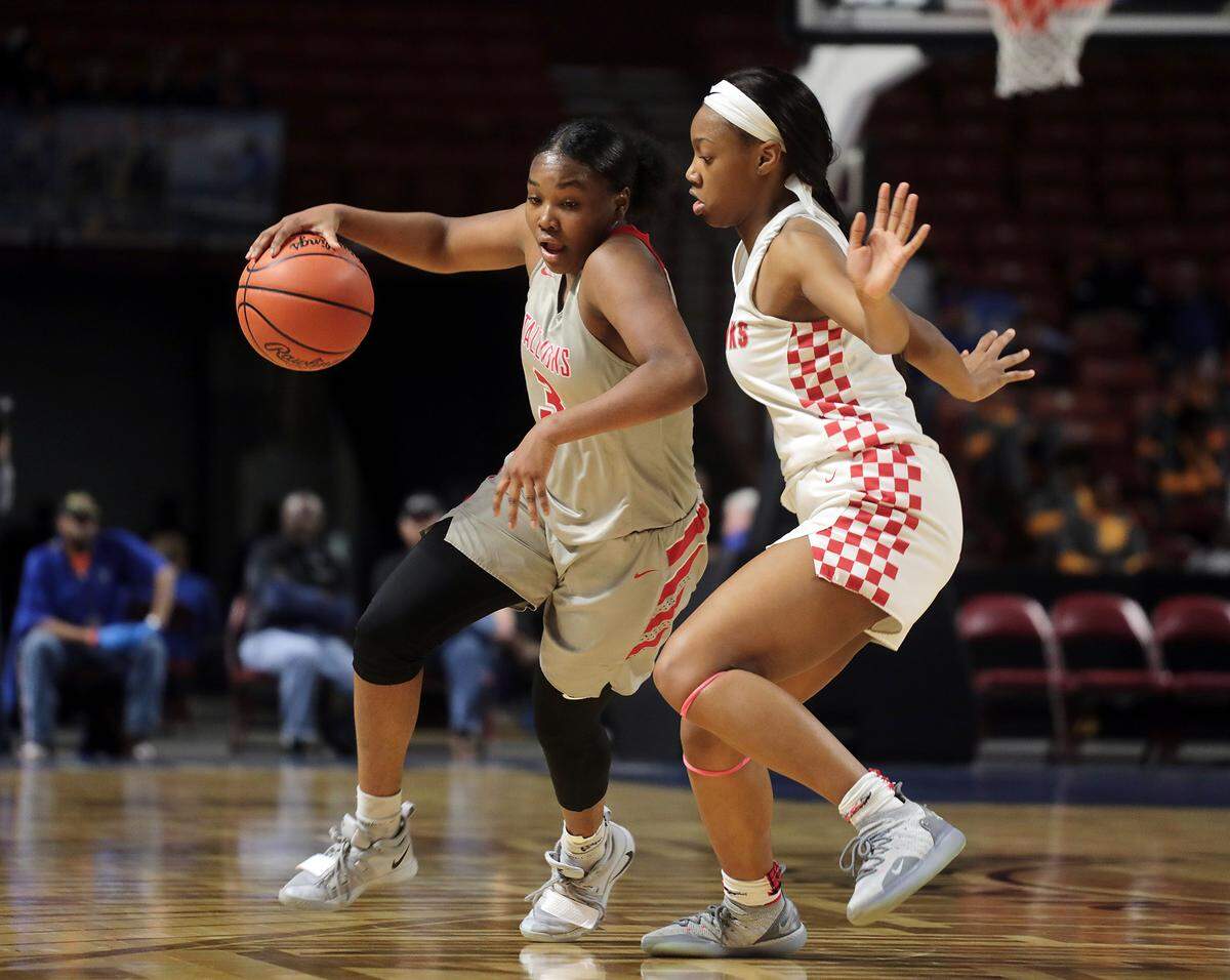 South Pointe’s Jamia Blake dribbles past Westwood’s Malayziah Etheredge.