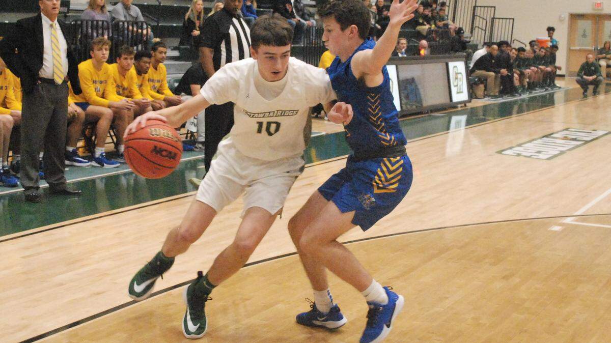 Catawba Ridge’s Carter Hendrick tries to get around Fort Mill’s Cabe Christopher during the two teams game recently.