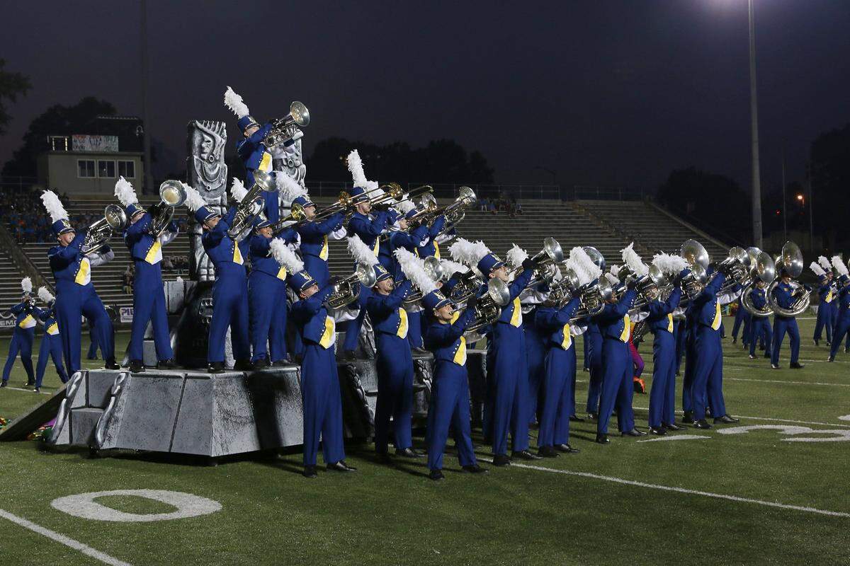 Fort Mill High School, shown in this file photo performing a “Birds of Paradise Lost” show, is a state record 24-time South Carolina marching band champion.