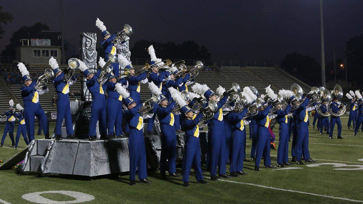 Fort Mill High School, shown in this file photo performing a “Birds of Paradise Lost” show, is a state record 24-time South Carolina marching band champion.