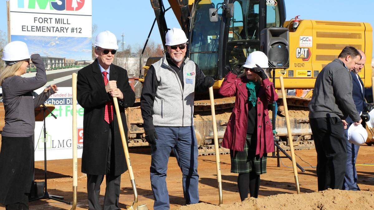 District staff and board members break ground on a new elementary school in Fort Mill, funded by impact fees. Voters approved a school bond referendum Tuesday that paves the way for other new construction.