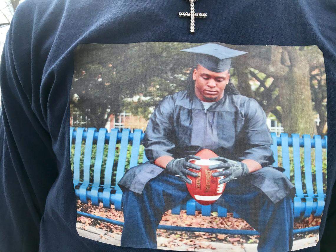 The photo is of a family member of Ariane Lamont McCree of Chester, South Carolina wearing a short with a picture of McCree when he graduated from Jackson State University in Mississippi in 2014. McCree was shot and killed by Chester police on Nov. 23 in an incident where officers said McCree showed a gun after being detained for shoplifting at a Walmart.