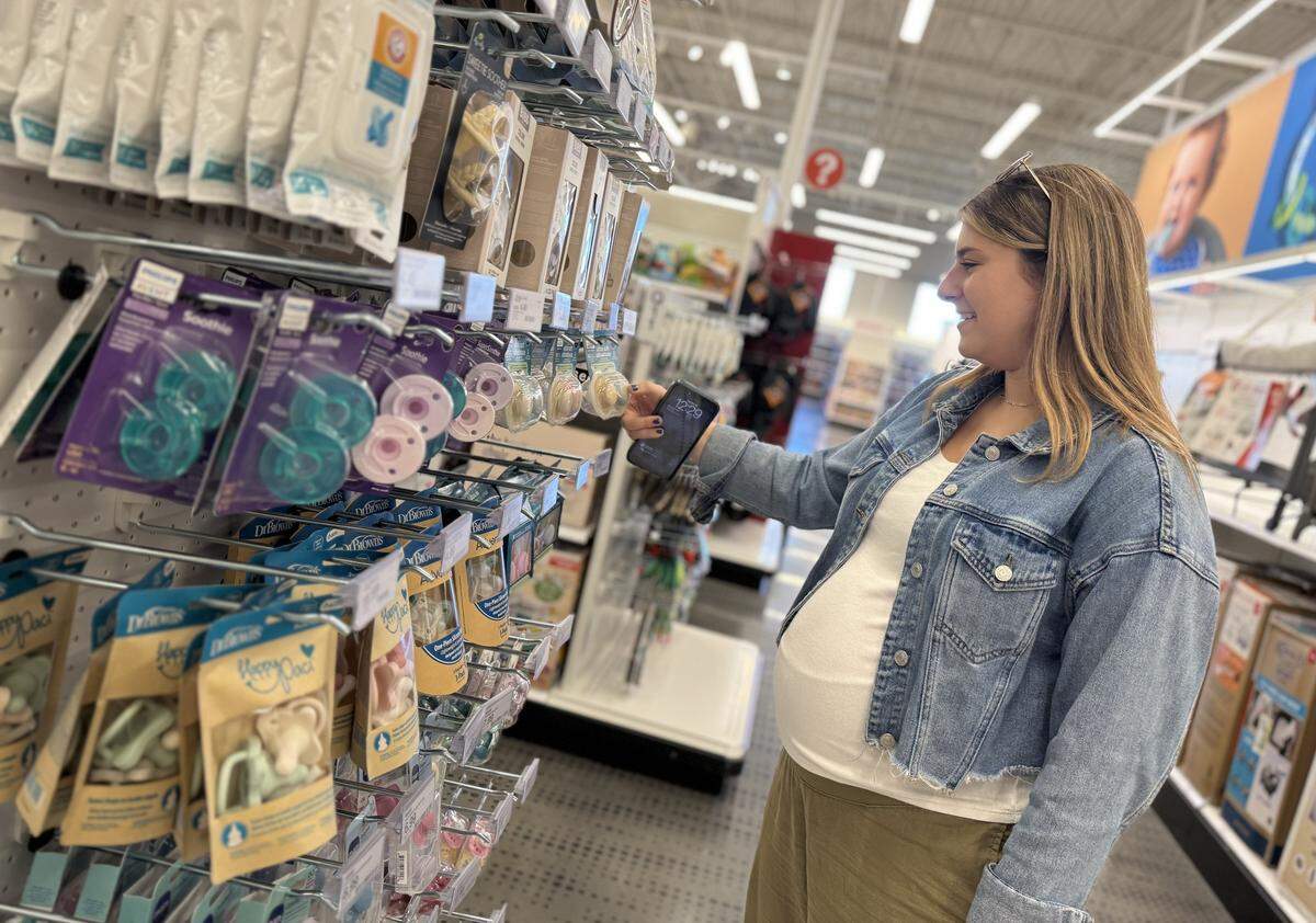 Madison Wilburn shops for baby supplies Tuesday at the new Indian Land Target. The new store opened Oct. 12, 2025