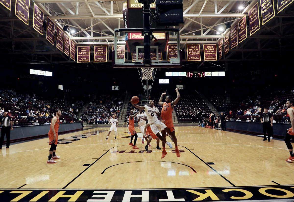 The Winthrop University and Mercer University men’s basketball teams compete in Rock Hill on Saturday, Nov. 13, 2021. Russell Jones Jr. goes up for a layup.