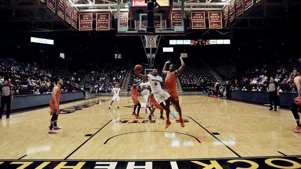 The Winthrop University and Mercer University men’s basketball teams compete in Rock Hill on Saturday, Nov. 13, 2021. Russell Jones Jr. goes up for a layup.