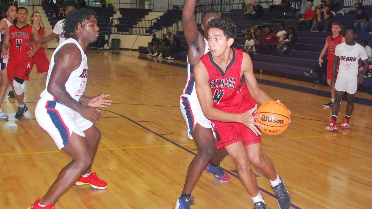 Nation Ford’s Petey Tuipulotu drives to the basket during the Falcons’ championship game at the Emerald City Classic.