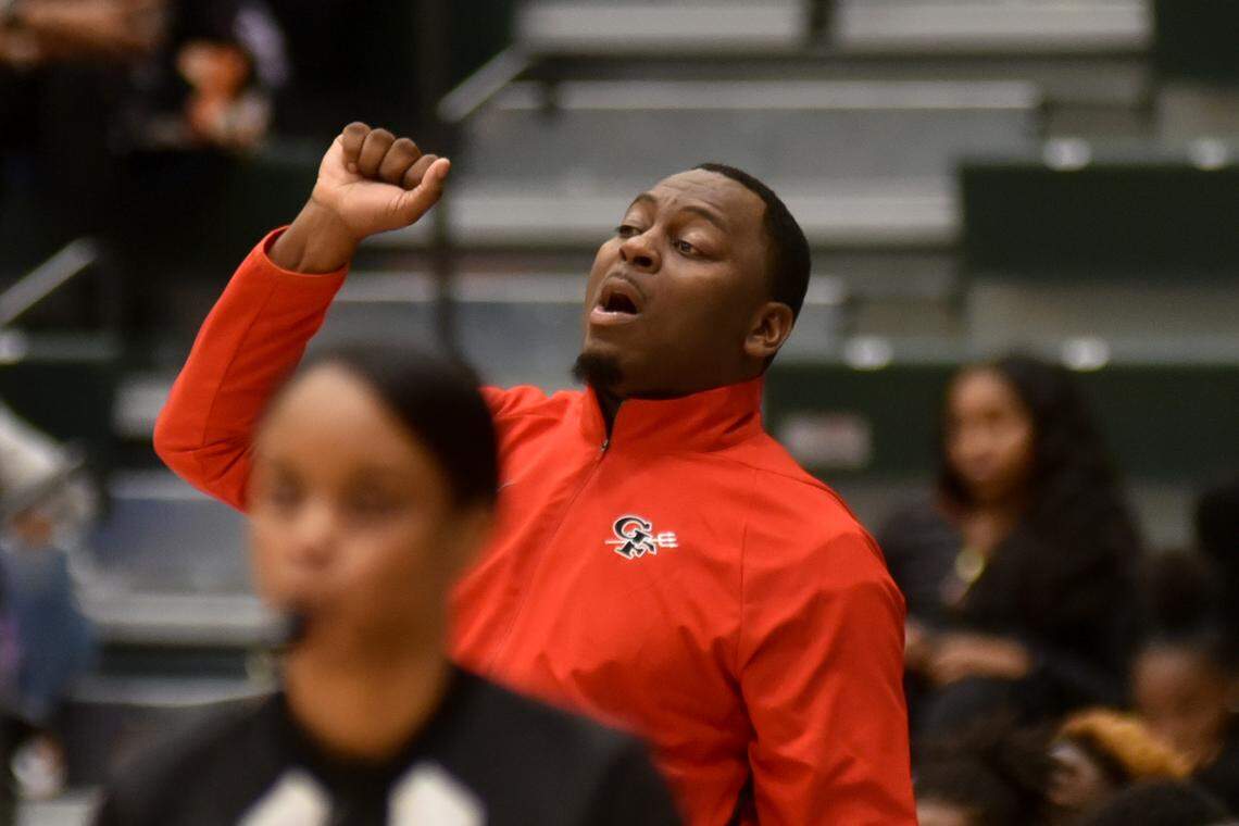 Great Falls head coach Alex Fair instructs his team from the sideline on Jan. 6 at Catawba Ridge at Great Falls.