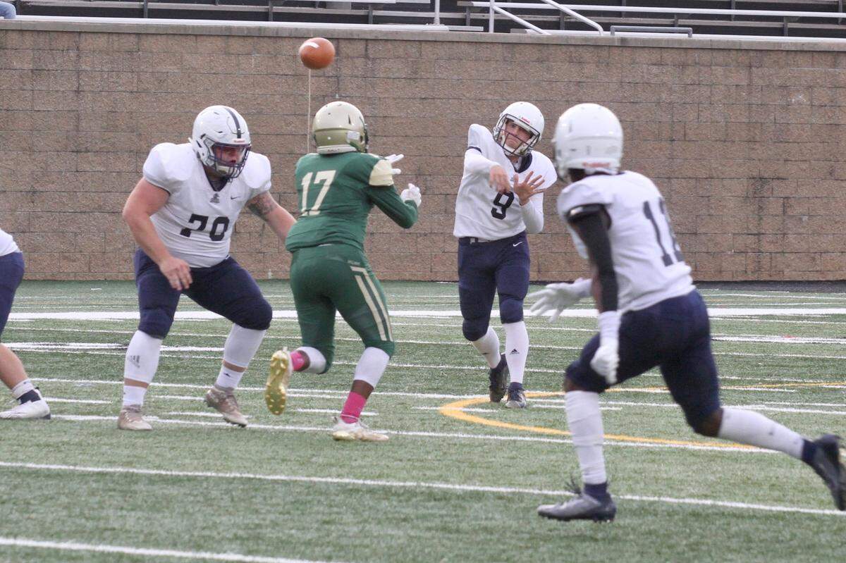 Legion quarterback Joey Hylinski throws to wide receiver Donaven Pittman at a recent scrimmage in Gaffney.