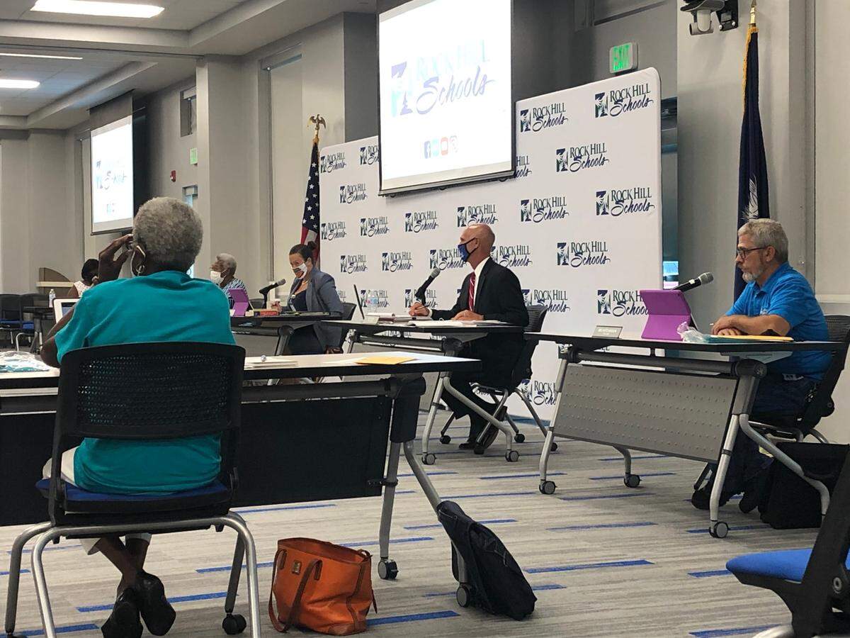 The Rock Hill Schools Board of Trustees and Superintendent Bill Cook discuss mask-wearing policies at a meeting on Aug. 10, 2020.