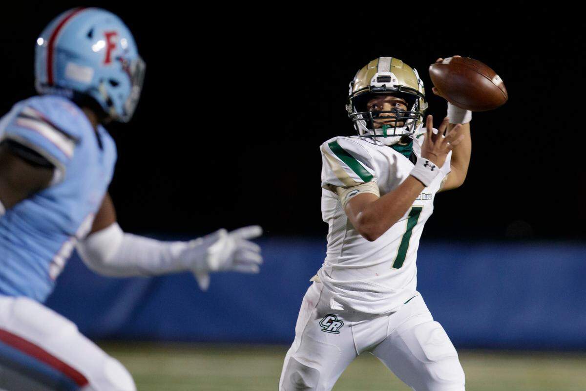 Catawba Ridge’s #1 Kayden Hager looks to pass as AC Flora hosts Catawba Ridge in a semifinal matchup of the 2020 SCHSL Football State Championships. 11-27-2020.