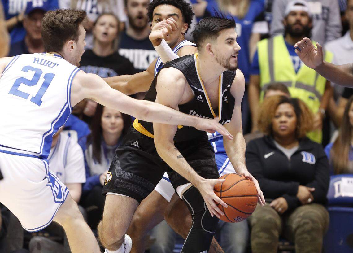 Duke’s Matthew Hurt (21) defends Winthrop’s Chandler Vaudrin (52) during the first half of Duke’s game against Winthrop at Cameron Indoor Stadium in Durham, N.C., Friday, November 29, 2019.