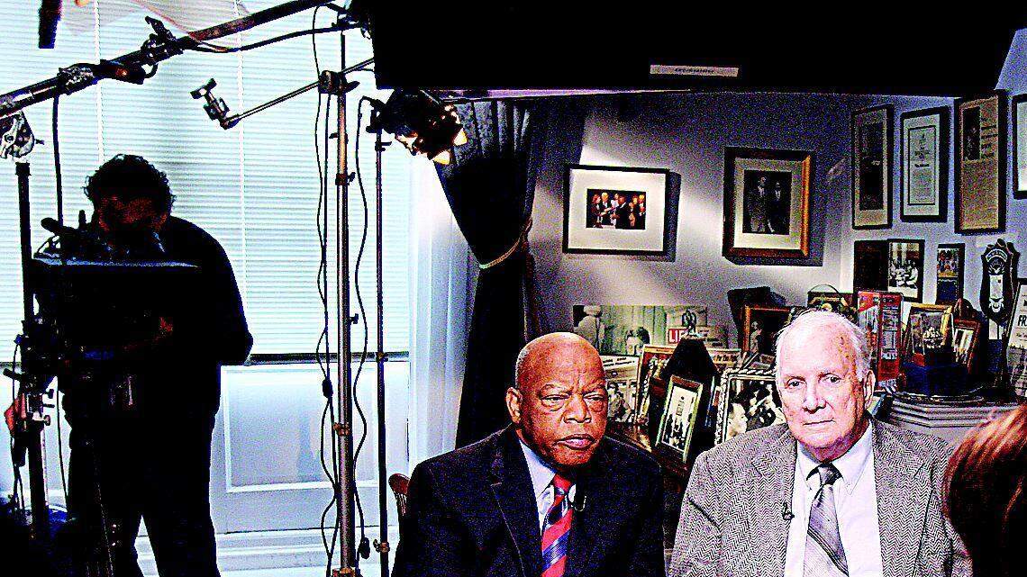 Photo 1: Fists turn to handshake, hope prevails as Rock Hill man apologizes on TV for 1961 attack on congressman