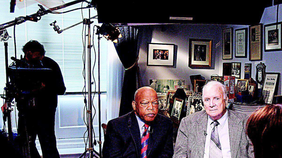 Photo 1: Fists turn to handshake, hope prevails as Rock Hill man apologizes on TV for 1961 attack on congressman