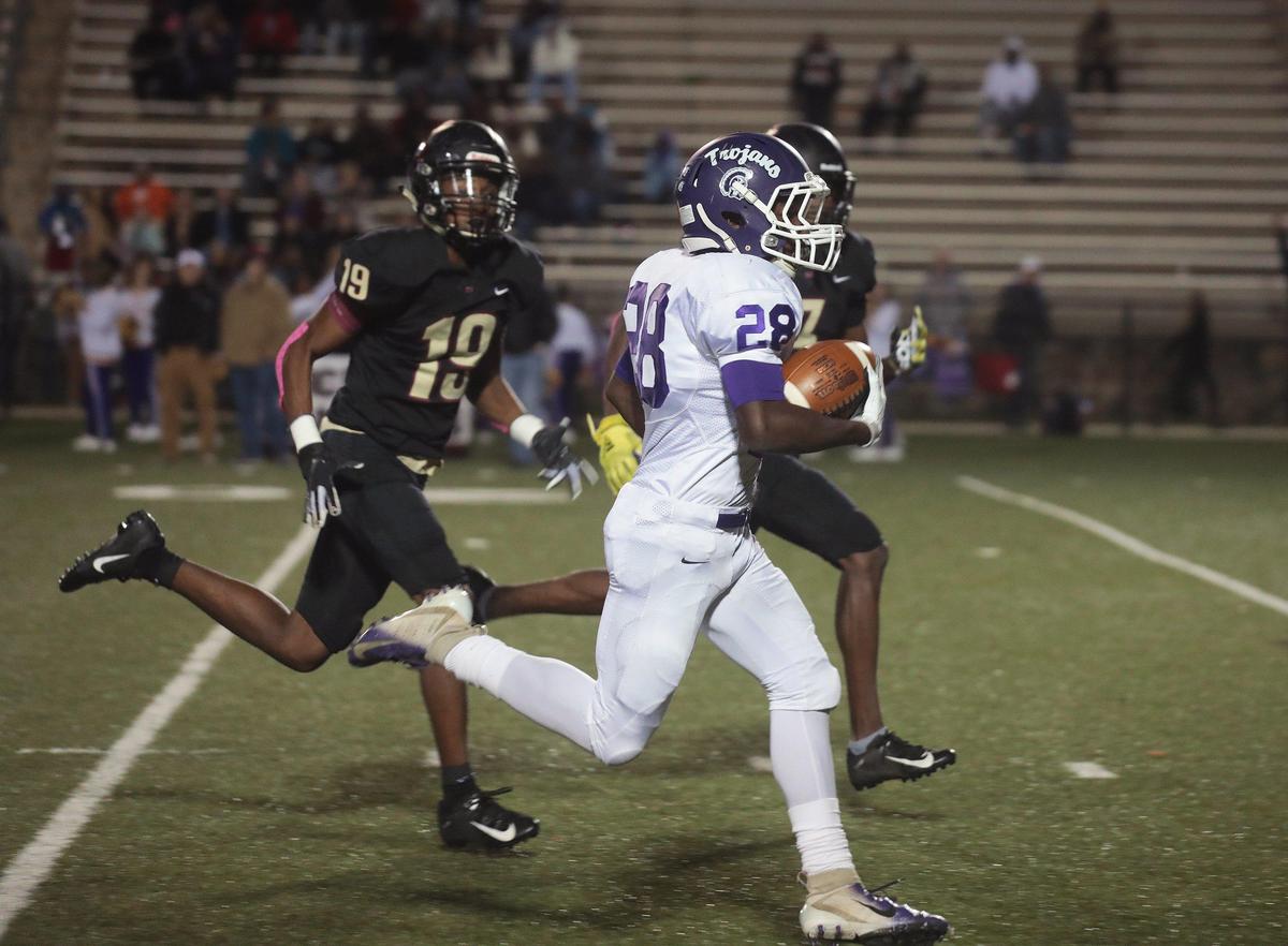Northwestern’s Jaylen Chavis carries the ball Friday at District Three Stadium.