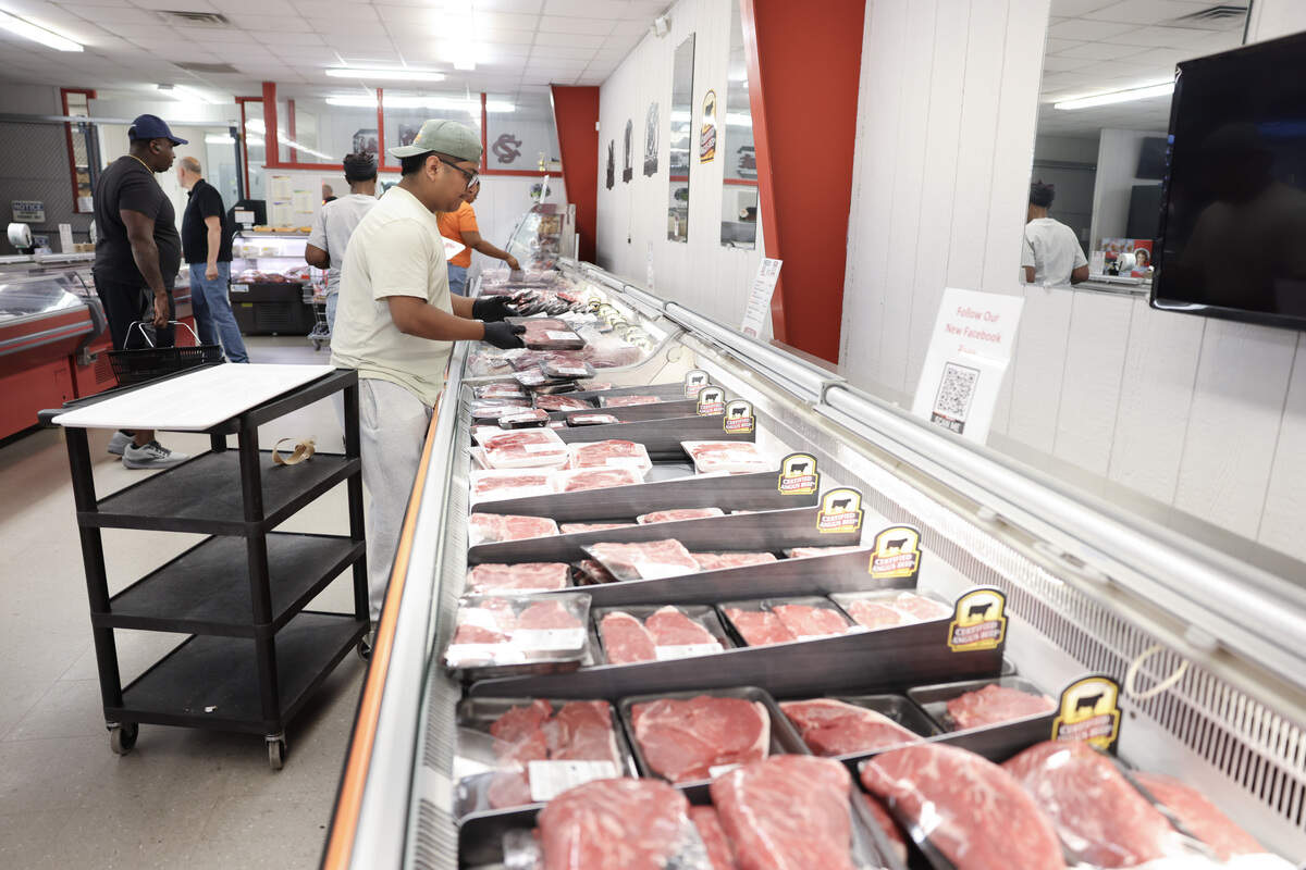 Alfredo Perez Diaz, employee of The Meat Center, lays out beef at the store in Lancaster on Tuesday, June 30, 2026.