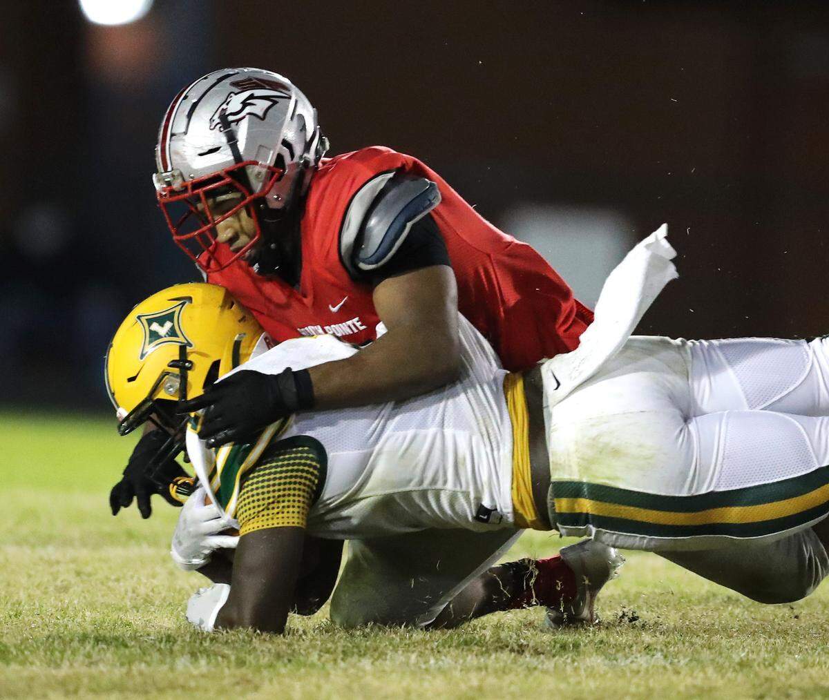 South Pointe hosted Laurens in the second round of the state playoffs November12, 2021. South Pointe’s Anquerious Davis takes down Zy Tod of Laurens. Andy Burriss-Special to The Herald