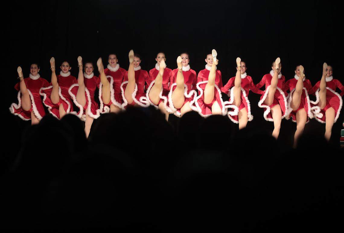 The Rock Hill Rockettes perform in front of thousands at the opening ceremony of ChristmasVille Thursday at Fountain Park.