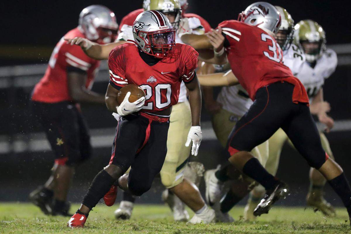 South Pointe’s Thomas Dandridge powers down the field as South Pointe hosts Catawba Ridge in Friday night varsity football.