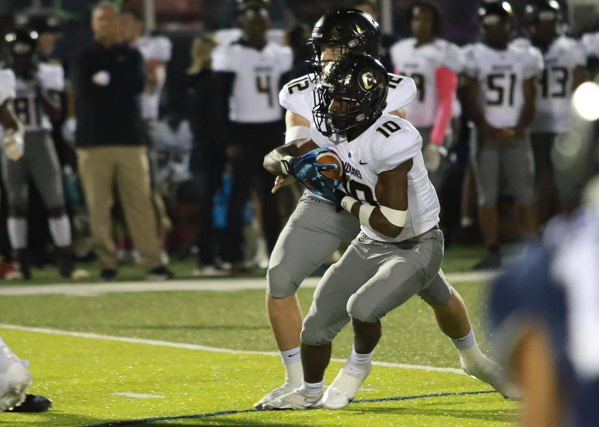 Tyler Smith takes a handoff in Gaffney’s 21-3 win over Clover on Friday night in Memorial Stadium.