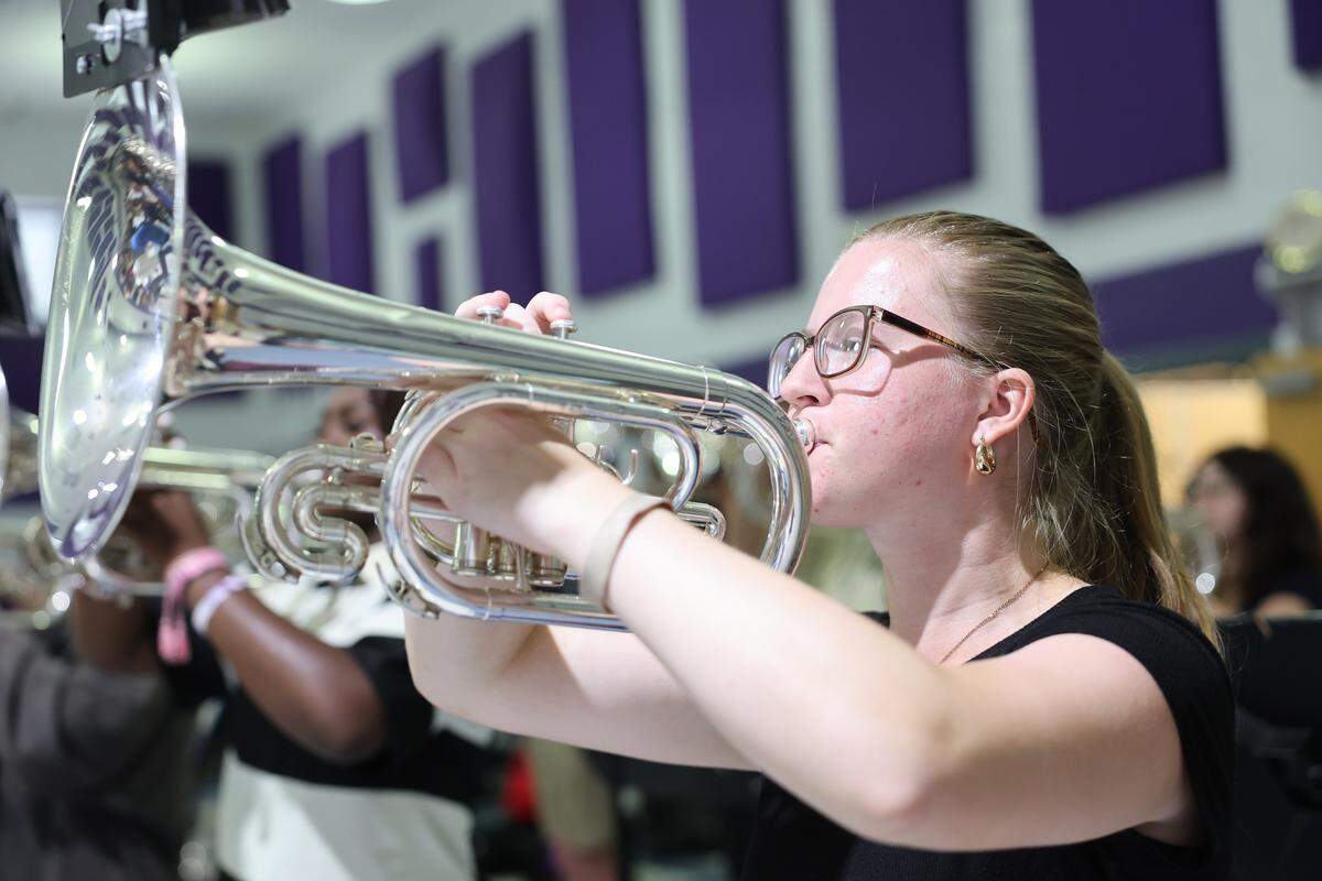 Northwestern High School band member Chloe McGuire rehearses at the school Friday, Aug. 8, 2025.