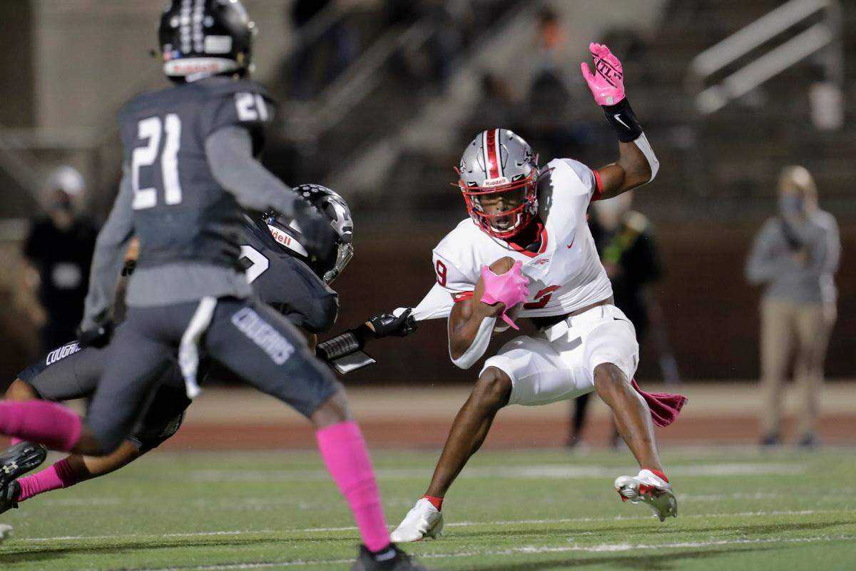 South Pointe’s #9 Omega Blake looks to break free in first half play as the York Cougars host the South Point Stallions in conference play Friday night, 10-23-2020.