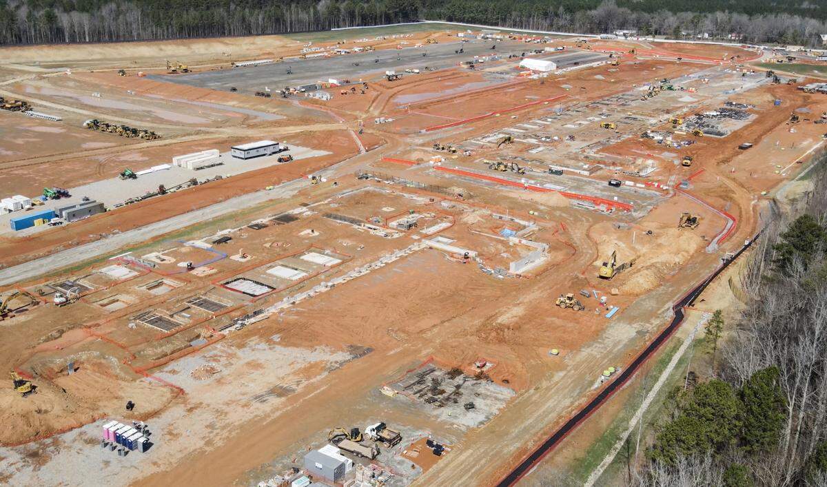 A massive construction site near Lake Wylie has transformed once-wooded land into a stretch of cleared ground as a $1 billion data center campus takes shape. The development, led by data center company QTS, will be a nine-building complex in York County.