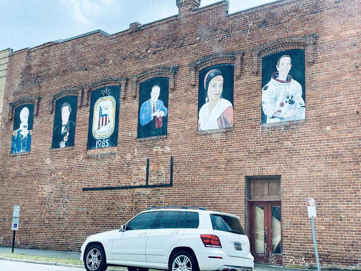 A mural in downtown Lancaster, S.C., recognizes prominent natives from the county, but not Jim Duncan.