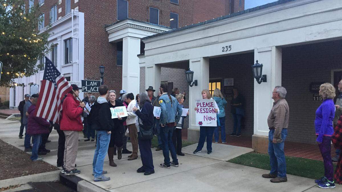 A crowd protested Trump’s firing of Attorney General Jeff Sessions in front of U.S. Sen. Lindsey Graham’s Rock Hill office Thursday night.