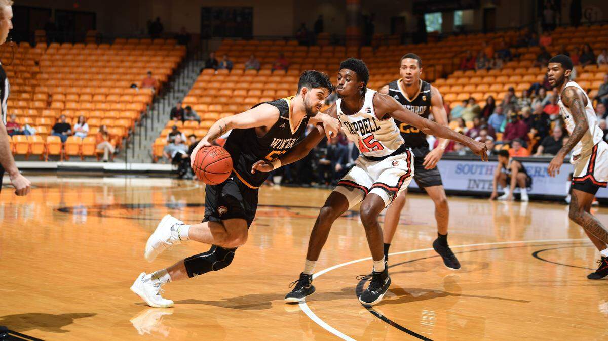 Winthrop guard Chandler Vaudrin drives around his opponent in the Eagles’ conference game against Campbell on Satuday, Jan. 4, 2020.
