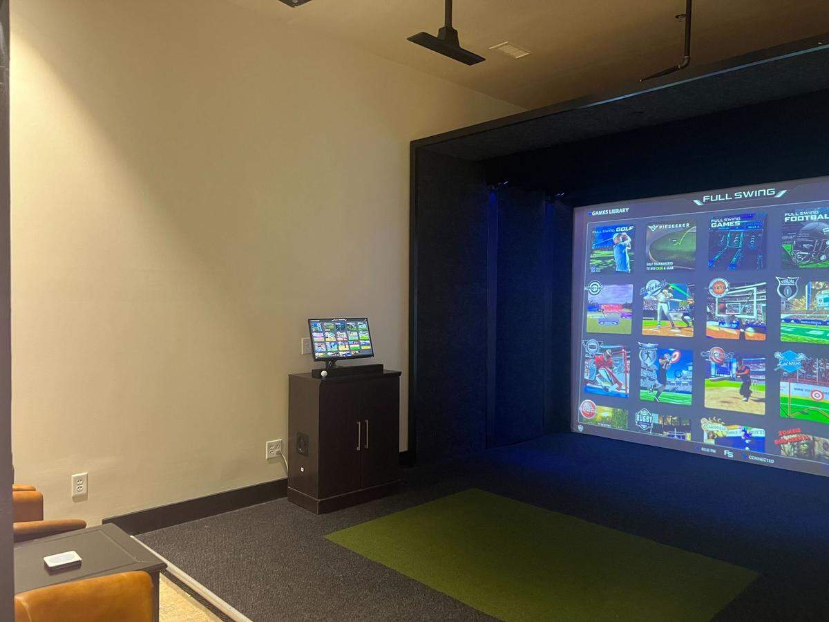 You can choose among multiple games — golf, baseball, basketball and more — at 19th at the Warehouses.