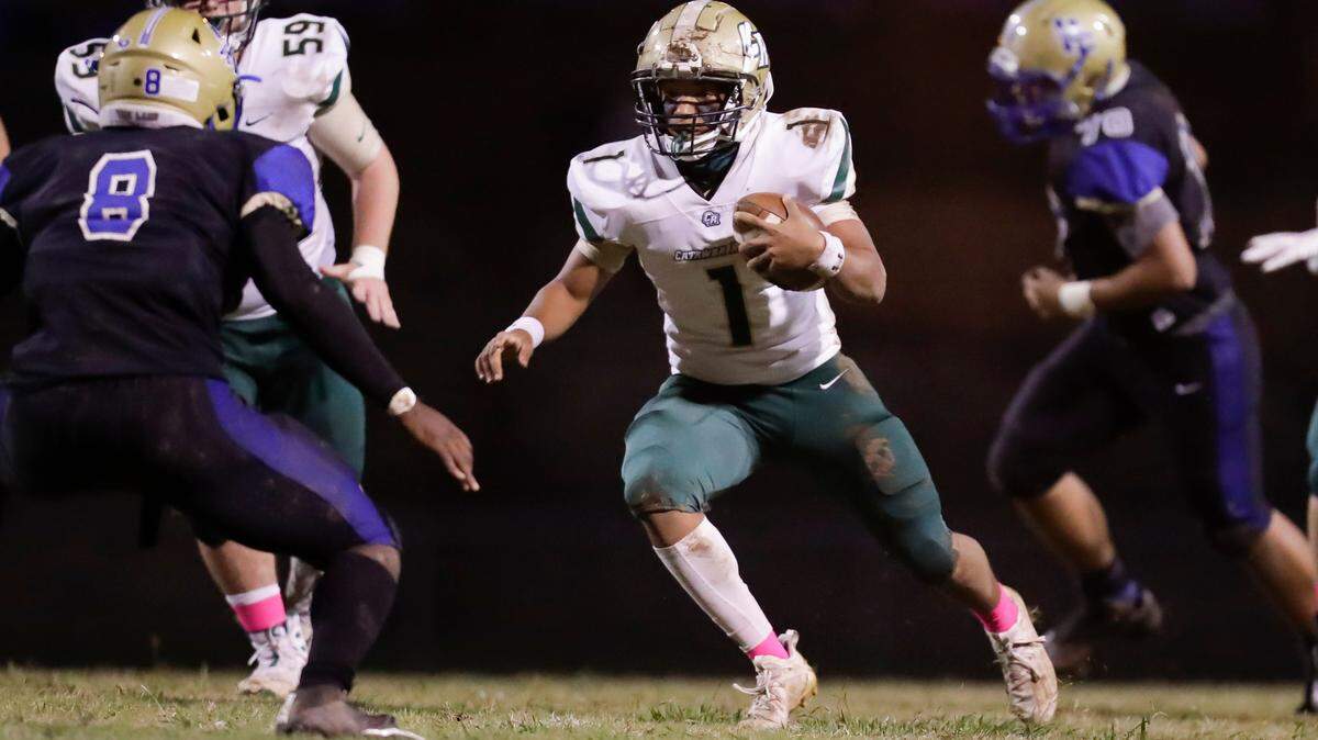 Catawba Ridge quarterback #1 Kayden Hager keeps the ball as Indian Land hosts Catawba Ridge in Friday night varsity football. 0-16-2020.