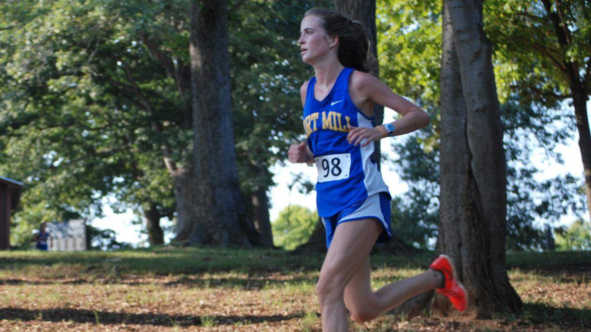 Fort Mill’s Elise Barradale nears the finish line in the Jackets’ cross country race against Northwestern at the Anne Spring Close Greenway on Tuesday, Sept. 10.