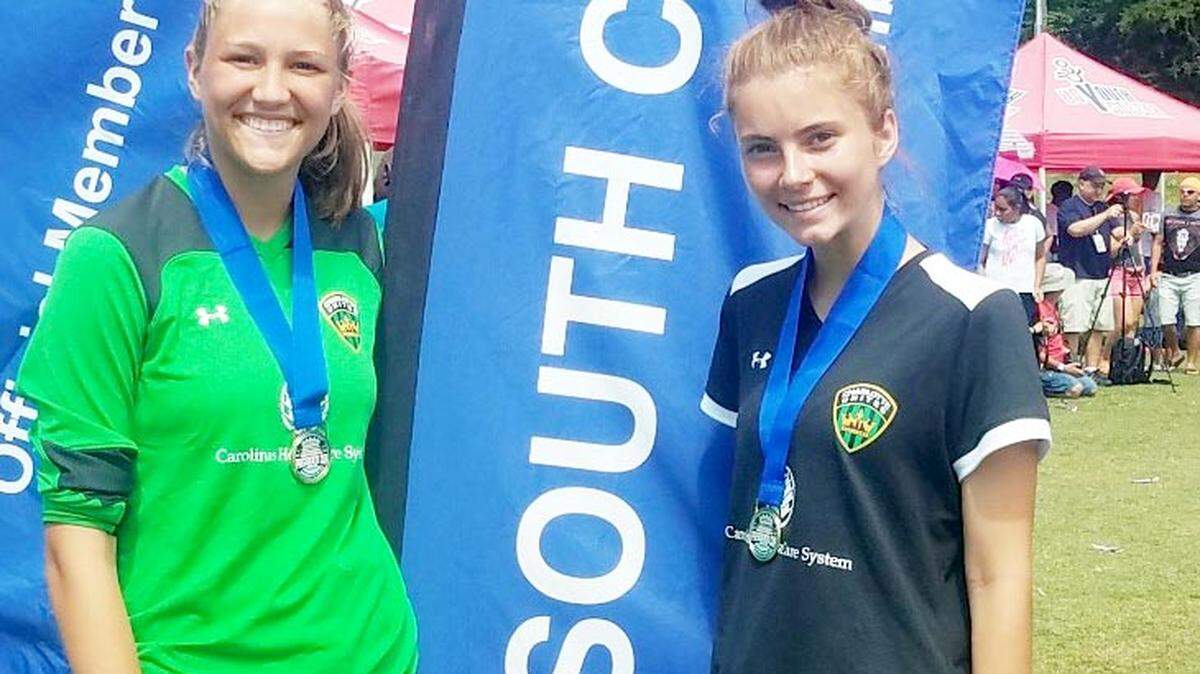 Charlotte United Gold players Teigan Eicher (left) and Isabelle Dyckes, are competing for a U18 national championship this week. Both are Nation ford High School graduates.