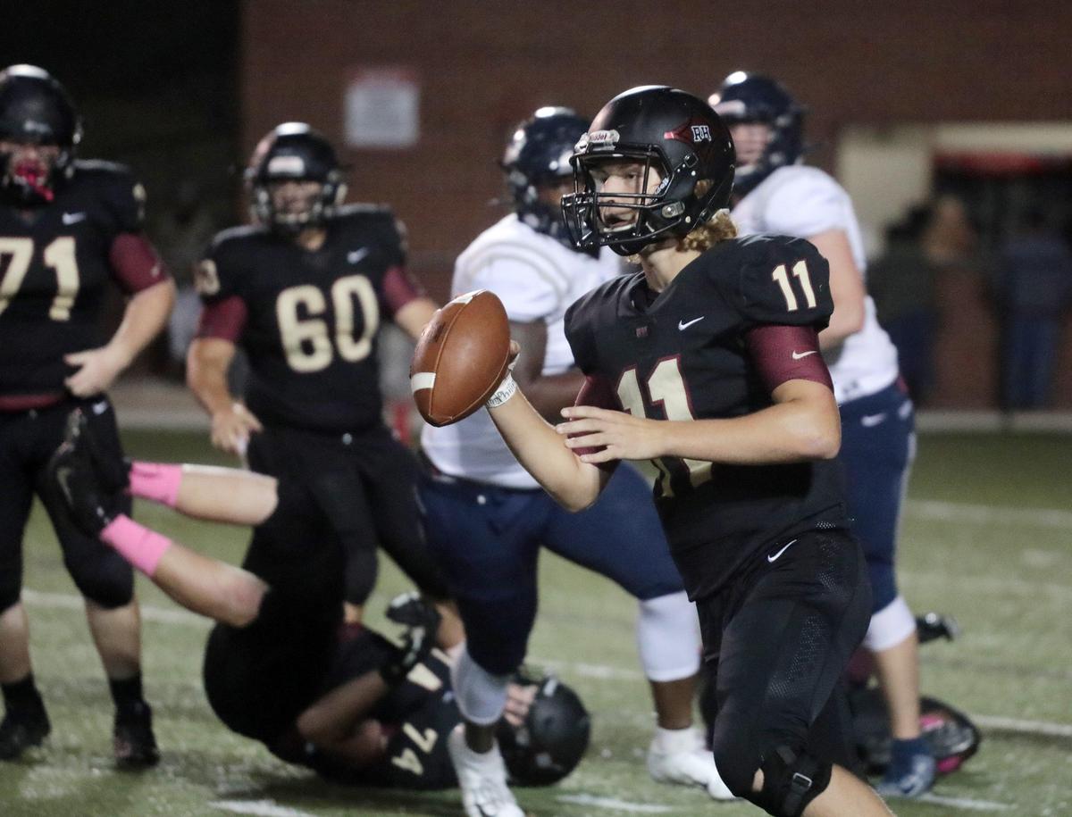 Rock Hill’s Jackson Roberson looks for an opening Friday as the Bearcats host the Clover Blue Eagles at District Three Stadium.