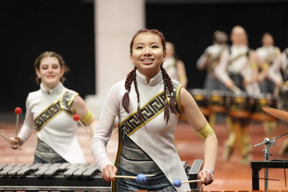 Candy Lan competes in the percussion production of “Medussa” for Clover High School’s indoor drumline.