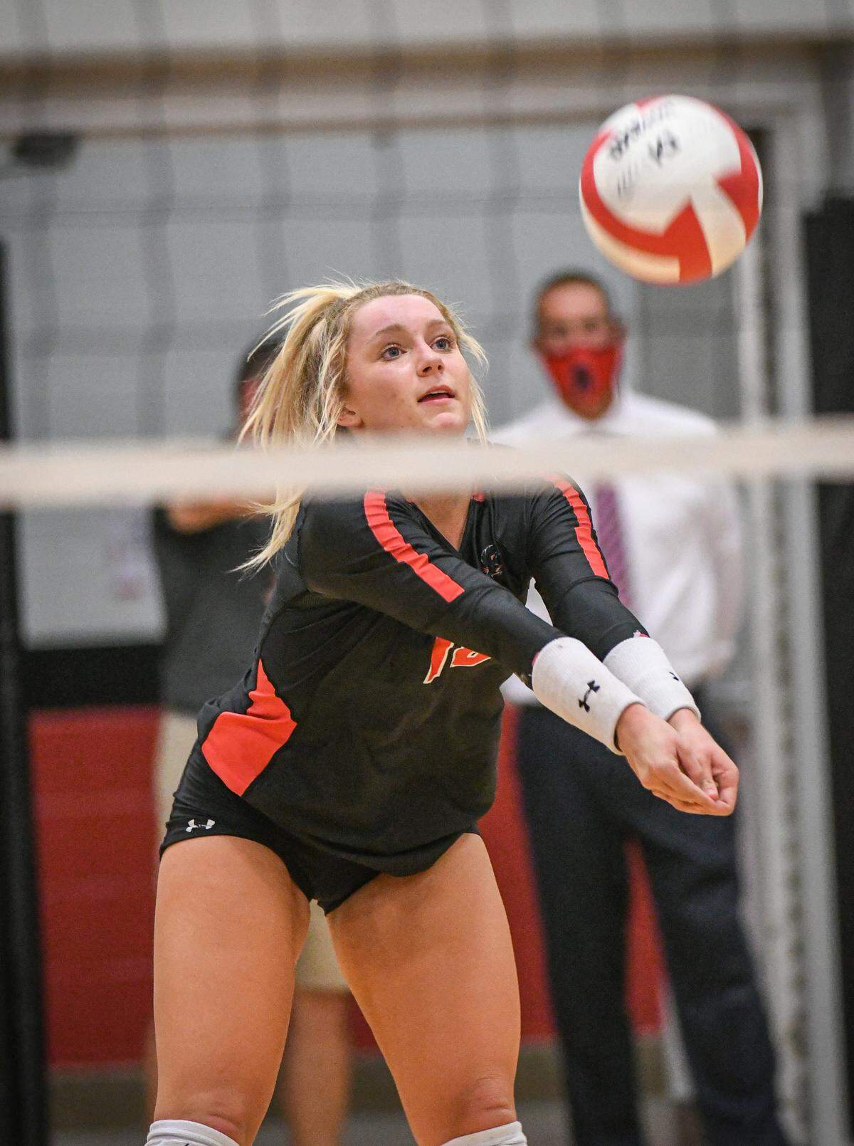 Junior Ainsley Marion prepares to pass to a teammate in Nation Ford volleyball’s game against Fort Mill.