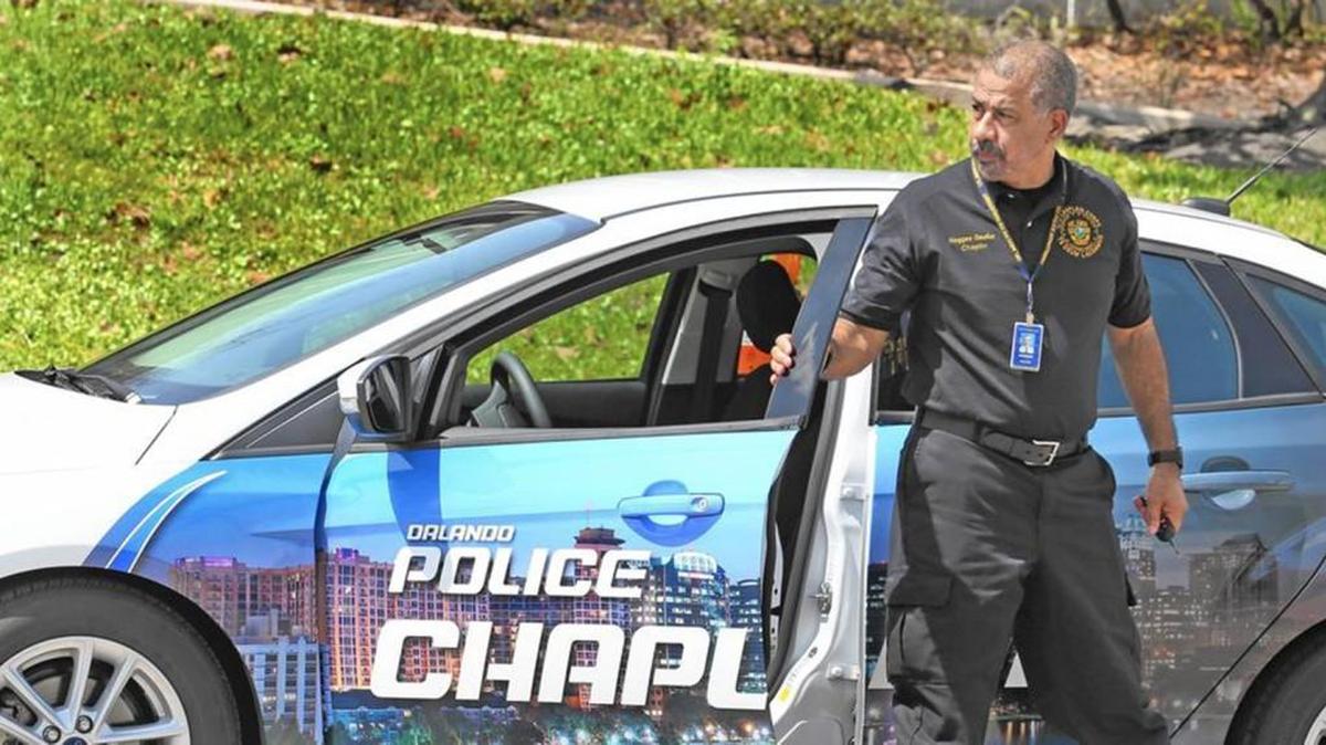 Haggeo Gautier, one of the Orlando Police Department chaplins, outside police headquarters. The Orlando Police Department’s Chaplain Corps was established to provide emotional, moral, and spiritual assistance and support to the employees, victims and the families of victims. There are seven active chaplains and four honorary chaplains.