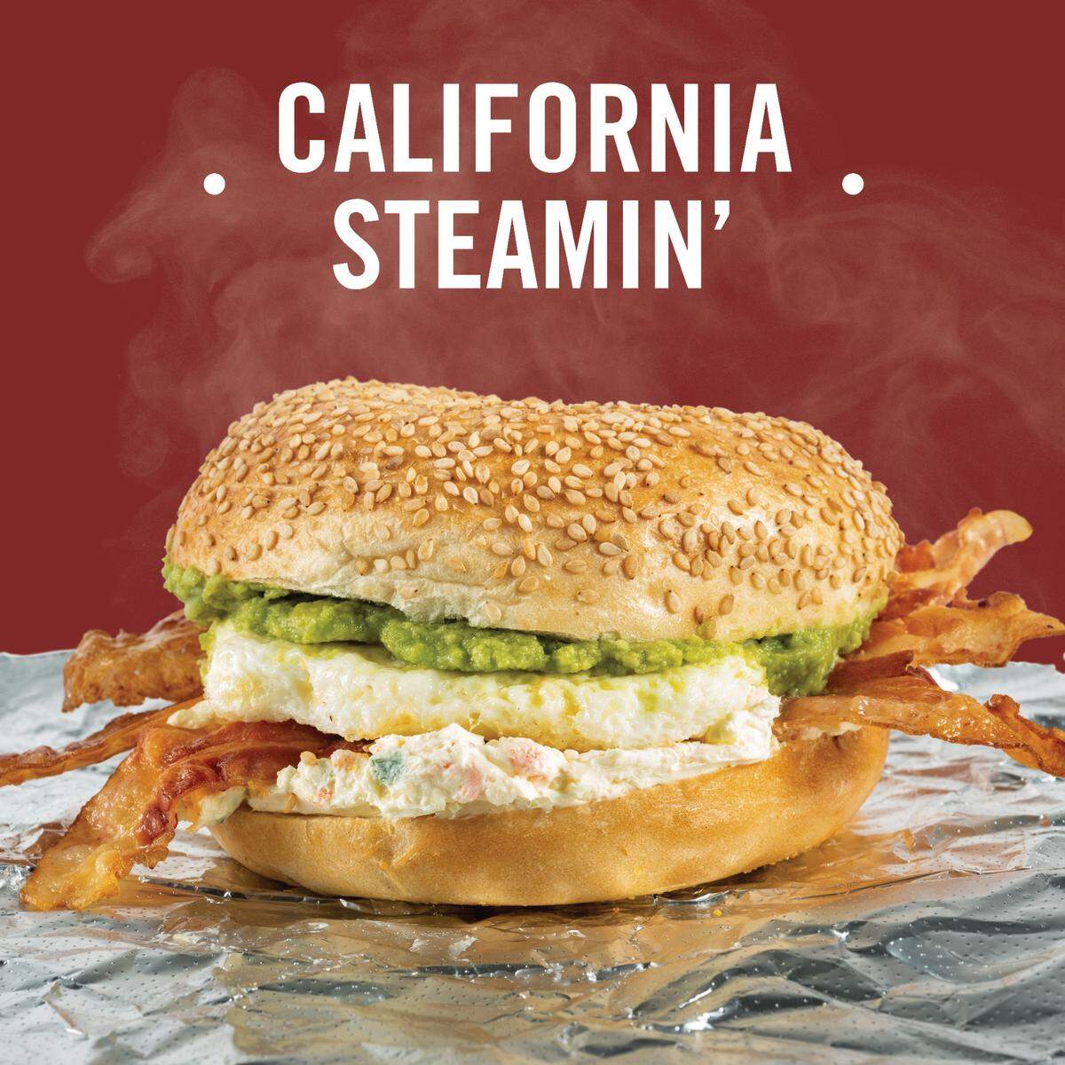 California Steamin’ has bacon, egg, veggie cream cheese and avocado on a steamed bagel breakfast sandwich.