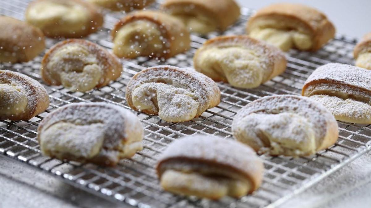 Judith’s cheese pastries, from ‘A Treasury of Jewish Holiday Baking’ by Marcy Goldman, are filled with cream cheese and farmer cheese, flavored with lemon zest and vanilla.