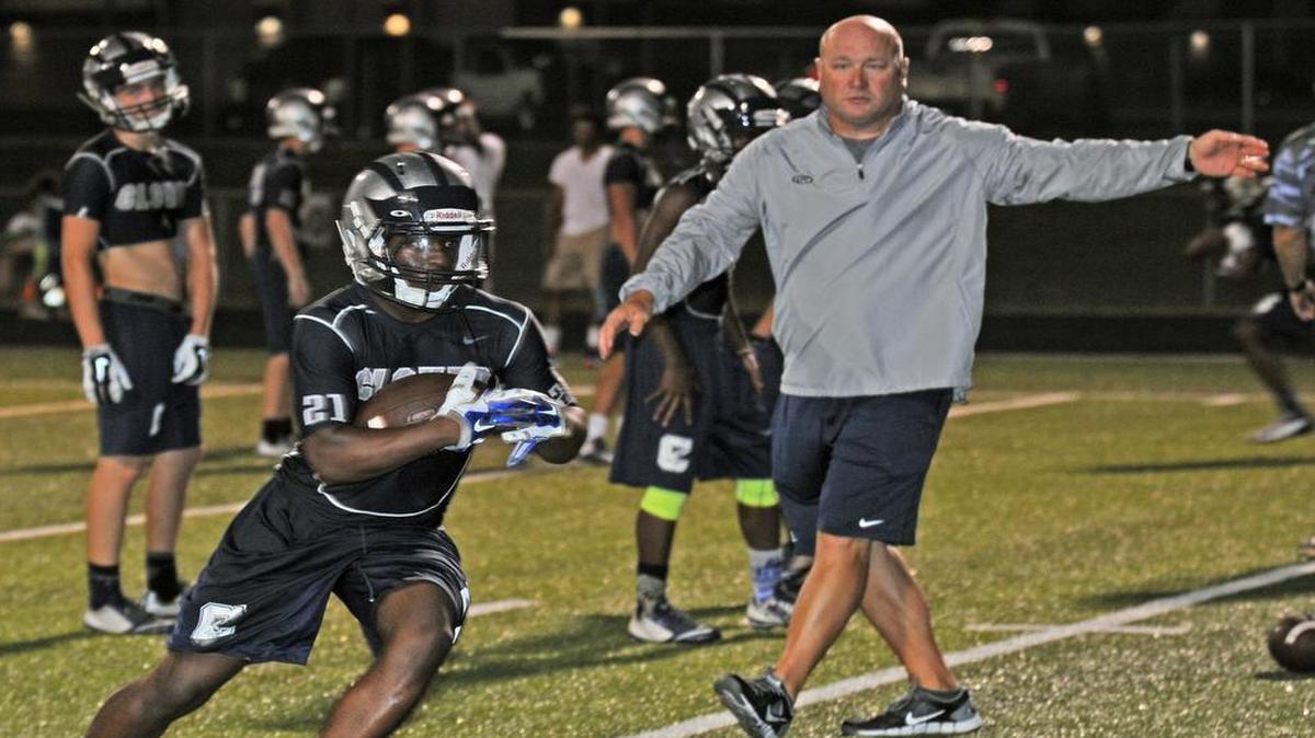 
Clover's Willy Clark turns upfield during a running drill early Friday morning.
