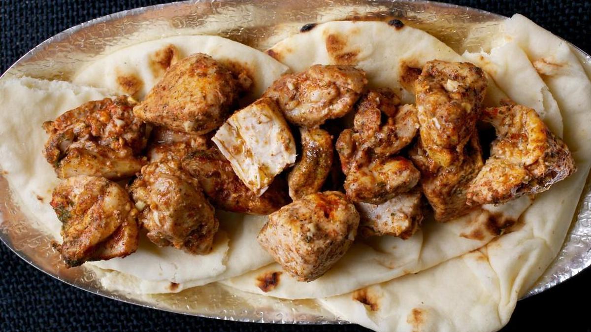 Tandoori Chicken tastes as close as you can get to the flavor of original tandoori chickens – it comes from an impeccable source in restaurateur Monish Gujral, whose grandfather, Kundan Lal, is the alleged inventor of that classic Indian dish..