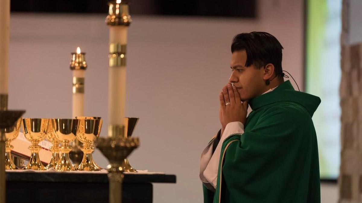 The Rev. Rey Pineda celebrates Mass at Misión Católica de Cristo Rey in Atlanta, as Congress tries to work out a deal regarding the fate of Pineda and hundreds of thousands of "dreamers" like him.